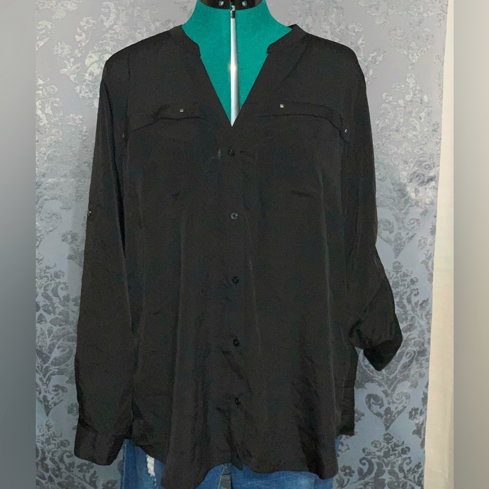 Black vneck button blouse, with silver accents and hidden pockets.
